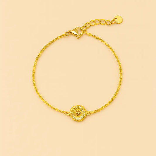 Bracelet chaine fine en acier inoxydable doré et petite fleur
